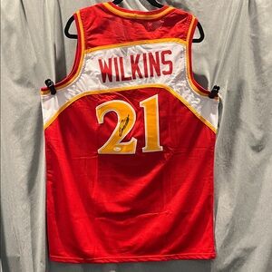 Dominic Wilkins Autographed Jersey with JSA authentication